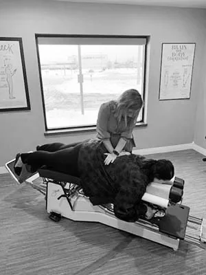 Chiropractor Kenosha WI Amanda Binder Adult Adjustment