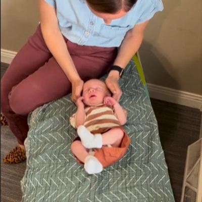 Chiropractor Kenosha WI Amanda Binder With Baby